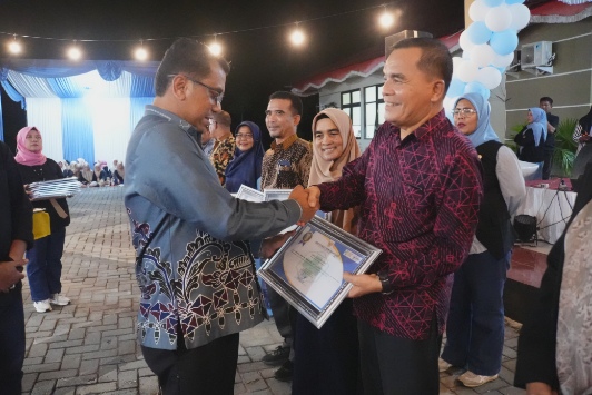 Semarak Malam Puncak HKN ke-61 di Kuansing: Sekda Zulkarnain Sampaikan Pesan Bupati Suhardiman Amby tentang Dedikasi Tenaga Kesehatan